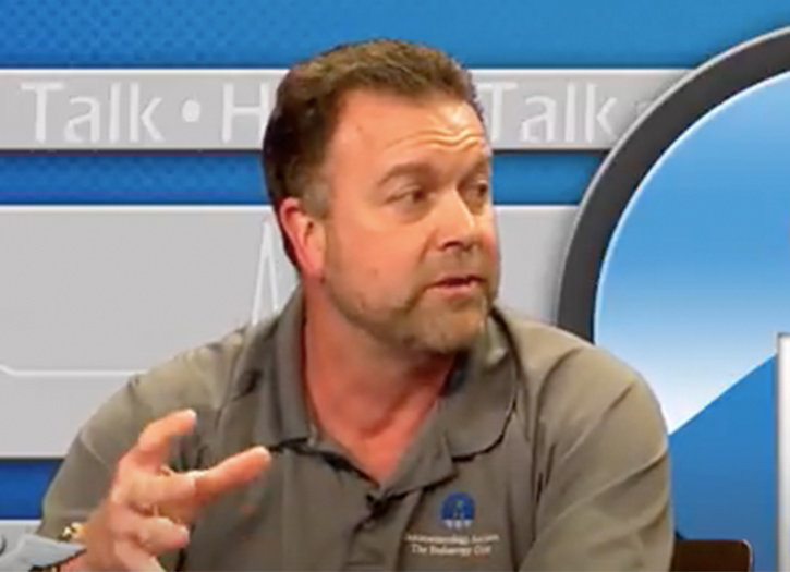 Man speaking on media channel